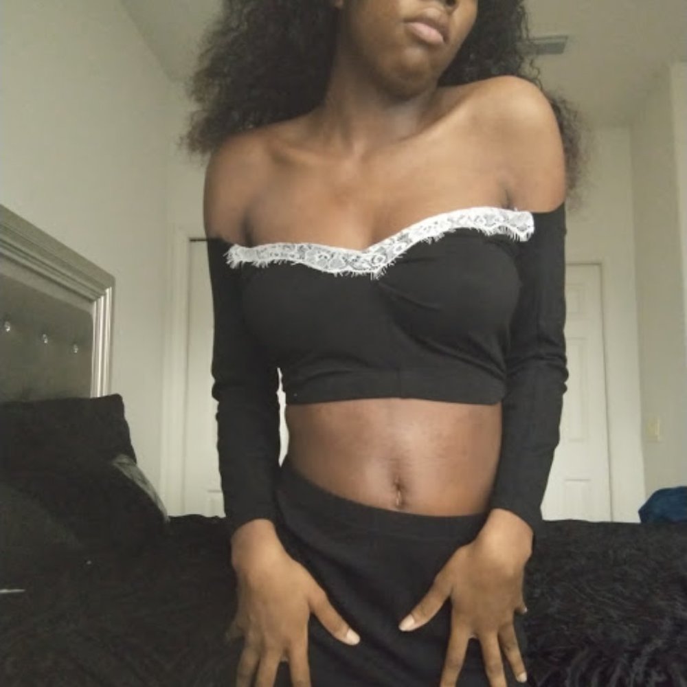 Size: Small and the color is black with white lace